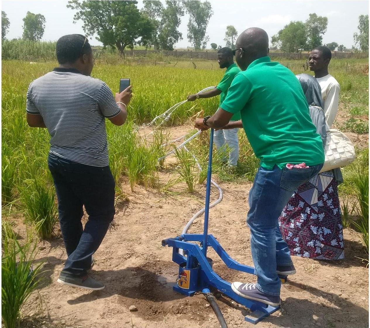 A community leader in Gombi LGA receives a power tiller, dry season farming support, 2018